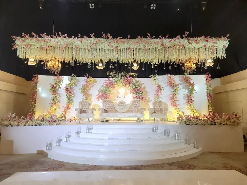 Wedding stage with floral ceiling Wedding stage with floral ceiling